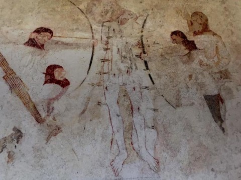The Martyrdom of St Edmund, from a c. 14th wall painting, St Mary's church Troston